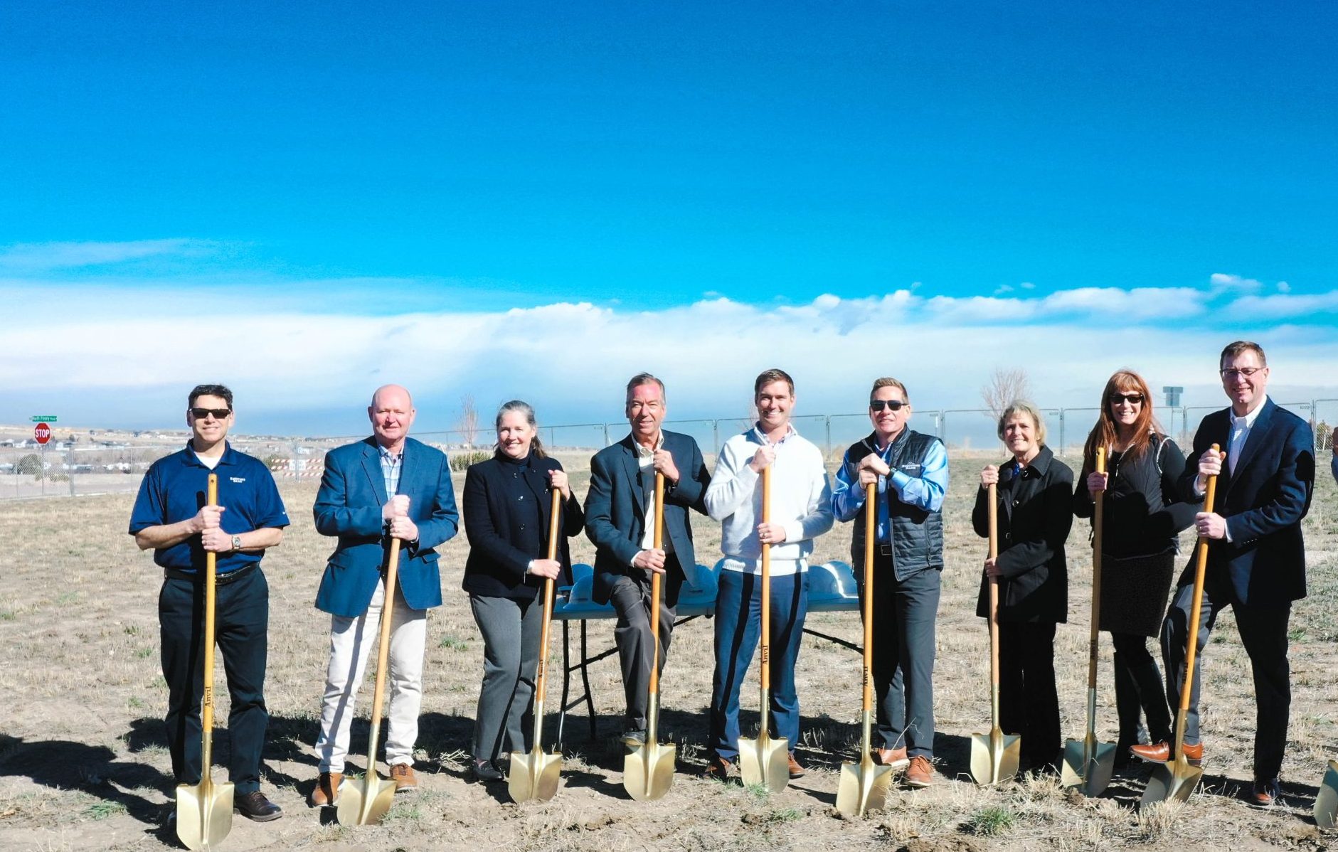 Parker groundbreaking photo with staff and board members.