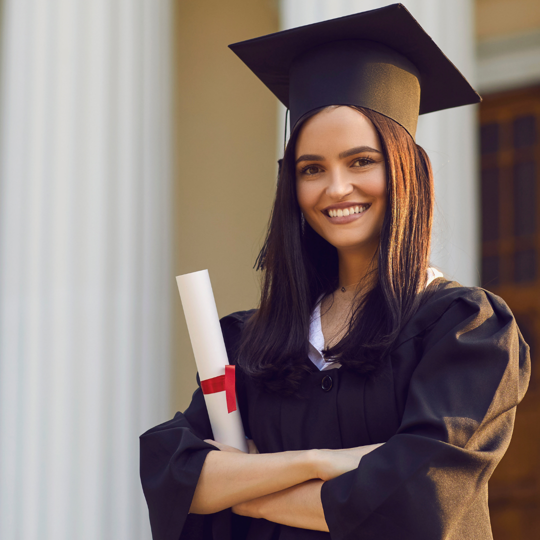 young woman in cap and gown